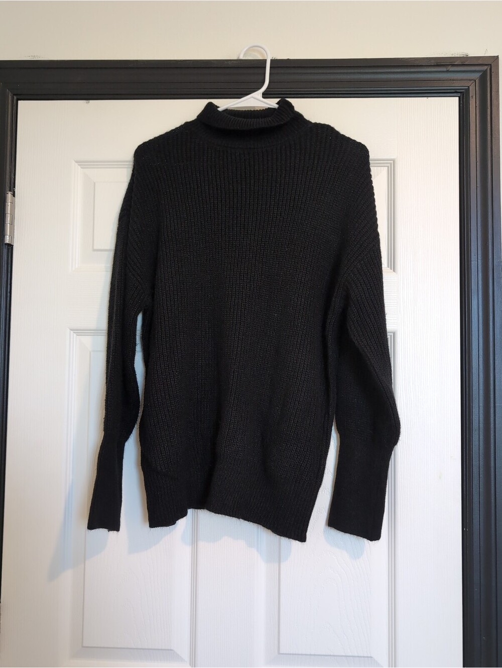 Large black turtleneck knit sweater